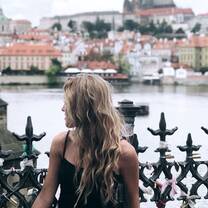 Student overlooks beautiful architecture