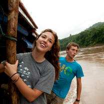 Two students on a boat