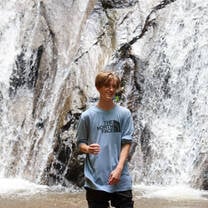 At a beautiful waterfall in Thailand