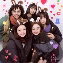 A group of CET Japan students and roommates with filters on their faces