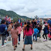 Volunteer and locals having fun