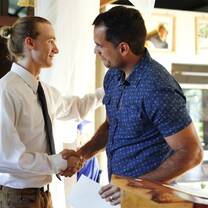Student receiving award at New Summit Academy