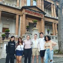 CET Brazil students standing outside of a building