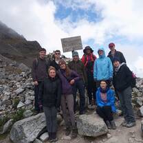  a group poses for a photo after hiking 