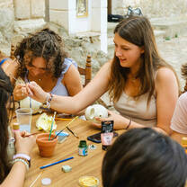 LITA students painting their own traditional water pitcher in an art workshop