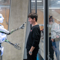 Student is in a demo for robotics in our labs 