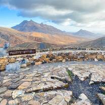Stunning view of the volcanic landscapes and rugged mountains in Fuerteventura, Spain, a breathtaking sight for RVF travelers.
