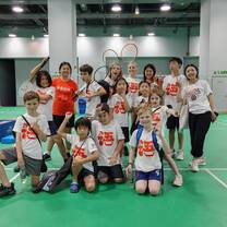 campers enjoy playing badminton