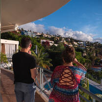 People standing to watch the view
