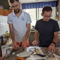 People cooking at kitchen