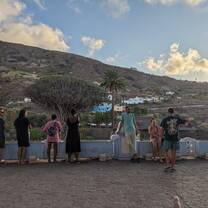 People standing to watch the view