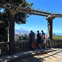 People standing to watch the view