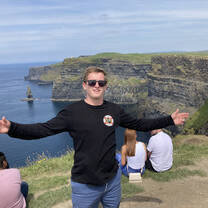 Students enjoying the cliff view