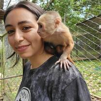 Volunteer with a monkey