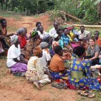 Women meeting with volunteers
