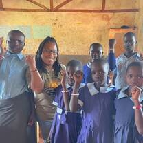 kenyan children with volunteer