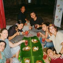 Volunteers enjoying a traditional Balinese dinner together with local staff members