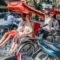 Students riding tuk tuk