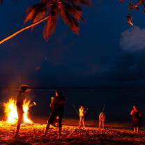 VISIONS Dominican Republic participants talking near bonfire