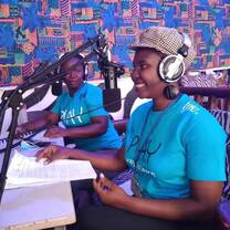 2 women talking into mics