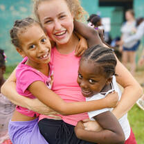 VISIONS Dominican Republic local kids with participant