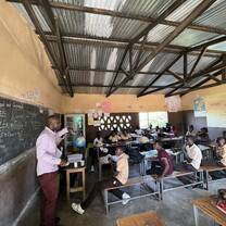 Teacher and student in class.