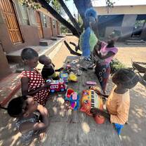 Children playing with toys received from volunteers. 