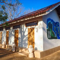 Toilet and Shower block with our divesite map on the wall
