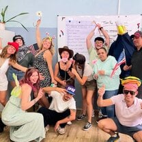 trainees in a classroom at The Language House celebrating their last day