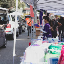 Volunteers distribute vital supplies