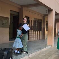Volunteer addressing children