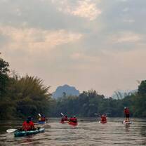 Team paddle down the river Kwai