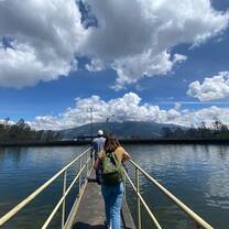 Students Crossing Lake near Andes Mountains