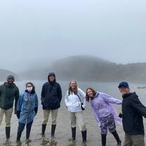 Students in Front of Foggy Lake