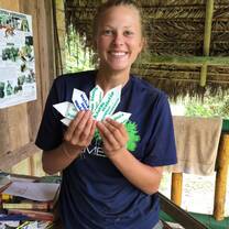 Reforestation Intern Holding Plant Tags