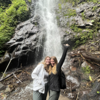 Students in Front of Waterfall