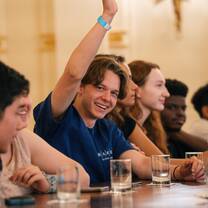 Student raising his hand