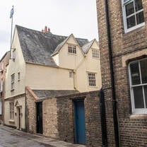 A 17th century building located in the heart of Oxford, with Greene's College Oxford Flag from the Rooftop