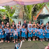 Xplore Cambodia group photo with students