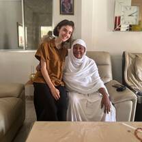 Student with her host mother in traditional dress at her home stay in Dakar, Senegal.