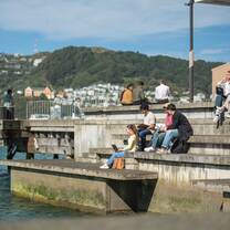 Students studying at the waterfront