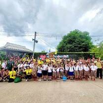 Students and teachers with raised fist hand