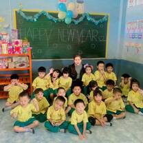 Happy New Year photo of kids and teacher