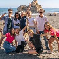 EF students taking selfies on the beach