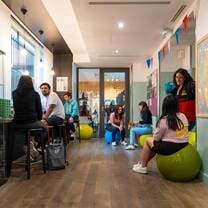 EF language year abroad students relaxing in one of the on campus lounges