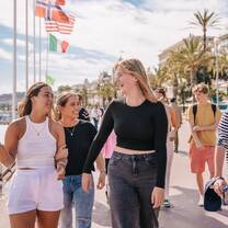 EF gap year students on an afternoon stroll by the cost