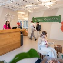 EF gap year students walking into the EF Munich school