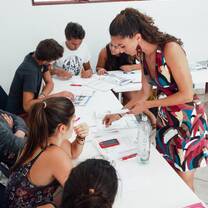 EF teacher working with students