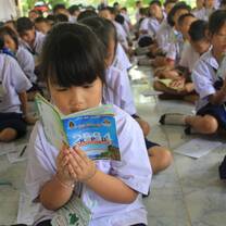 Kid reading a book