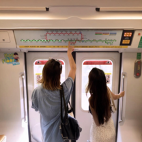 EF students using their Mandarin Chinese skills to navigate public transportation in Singapore